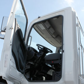 side view of truck cab with door open